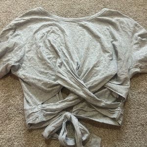 Cute grey t-shirt with ties on both sides.